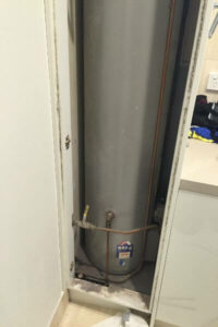 Hot water replacement before our Northern Beaches plumbers installed the new unit
